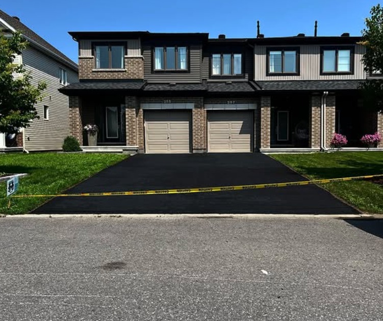 Townhome driveway sealed by Seal Bros